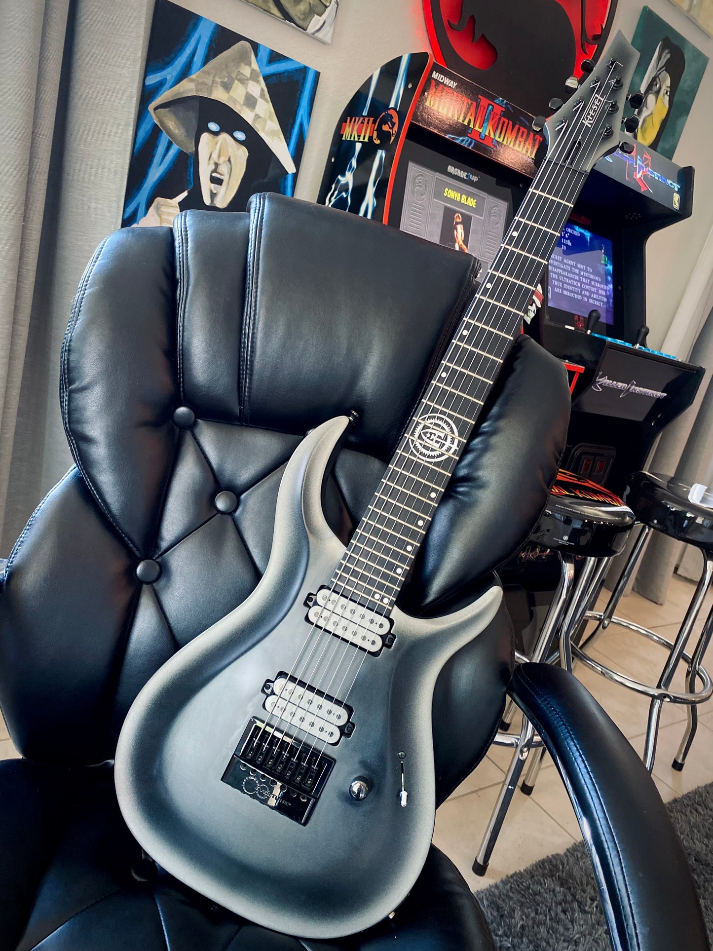 Black and Silver 7 string Kiesel guitar