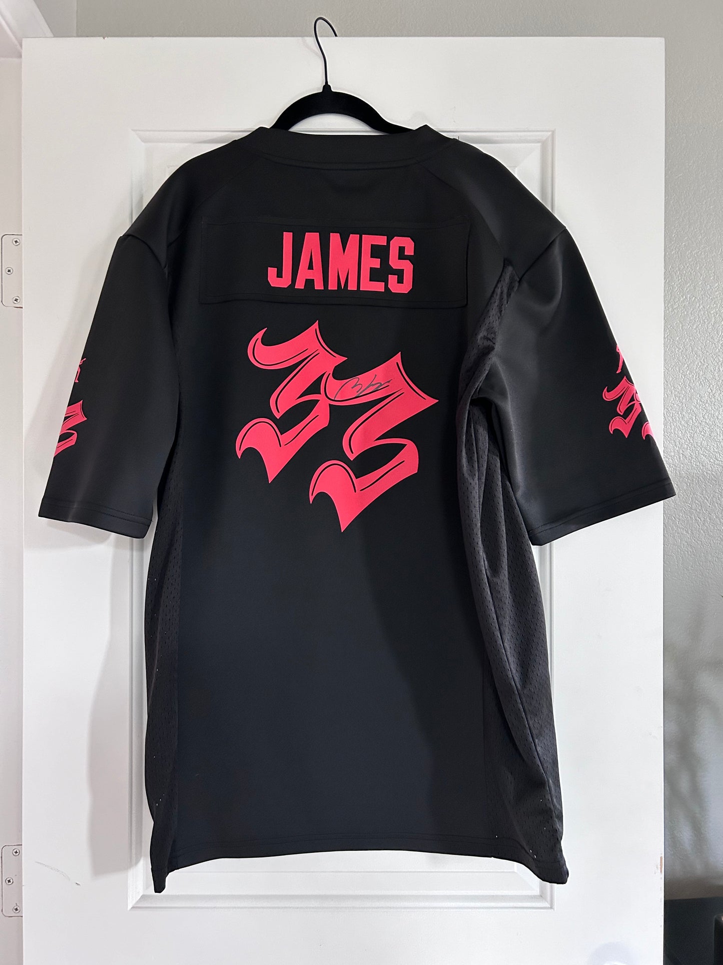 Signed and stage worn Andy James jersey - Black & Red 33 Portland