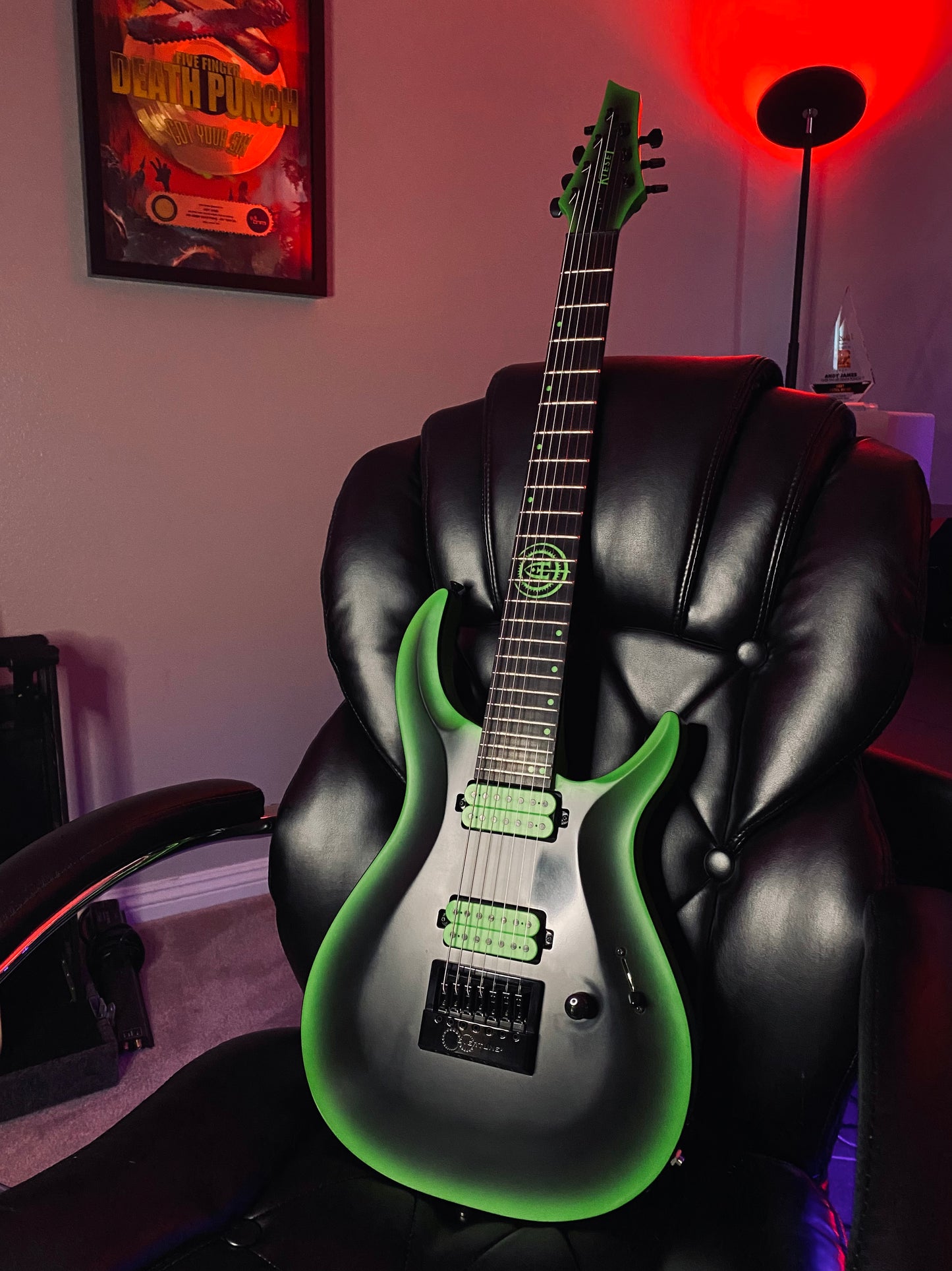 Black and Green 7 string Kiesel guitar